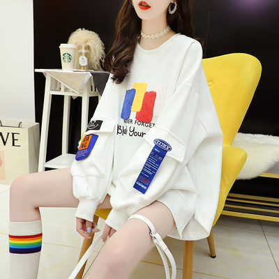 Lai sügisene dressipluus kirja ja embleemiga naistele