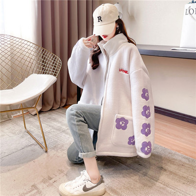 Női széles pulóver mély zsebekkel és cipzárral