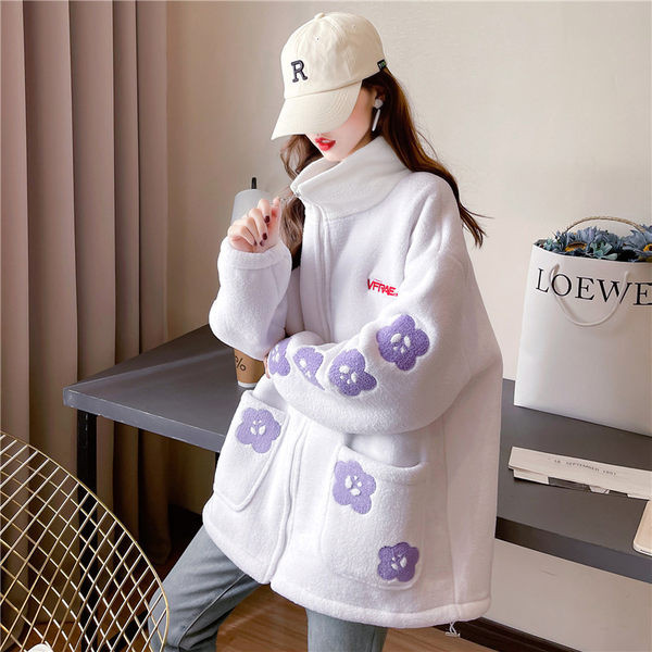 Női széles pulóver mély zsebekkel és cipzárral