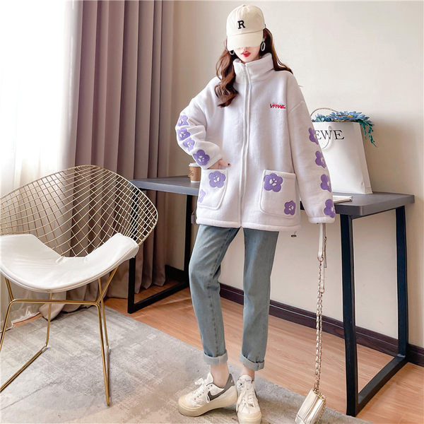 Női széles pulóver mély zsebekkel és cipzárral