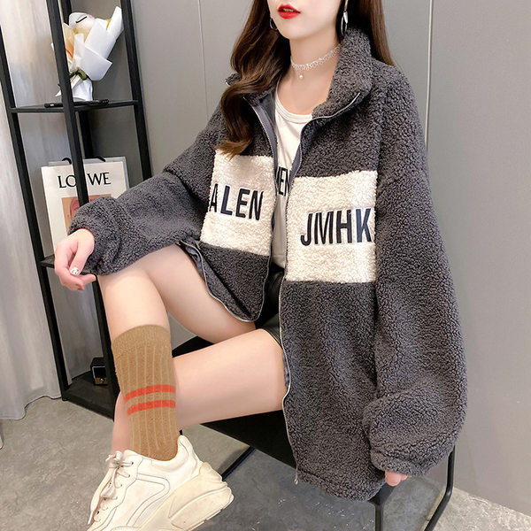 Naiste kõrge krae ja tikandiga dressipluus