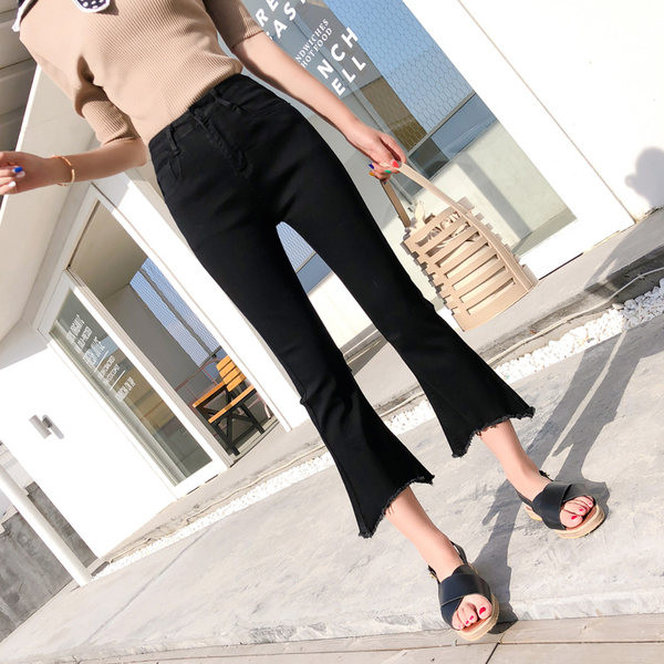 Asümmeetriliste servadega Charlestoni naiste teksad