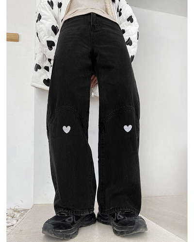 Laia mudeliaplikatsiooniga ühevärvilised naiste teksad