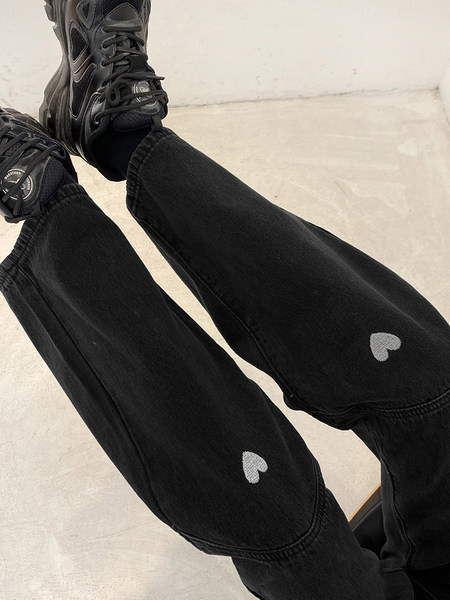 Laia mudeliaplikatsiooniga ühevärvilised naiste teksad