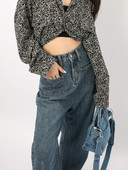 Lai esitaskutega naiste teksapükste mudel