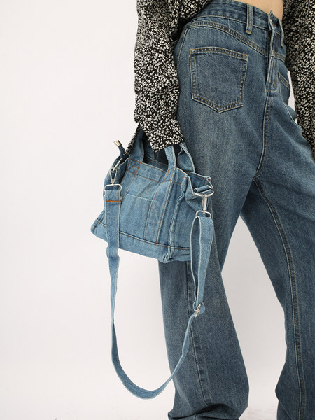 Lai esitaskutega naiste teksapükste mudel