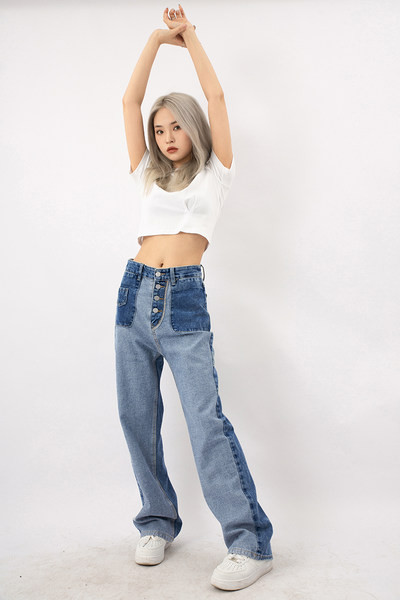 Moodne naiste teksapükste lai nööpidega mudel