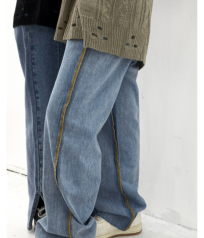 Γυναικείο φαρδύ τζιν με μπορντούρες και σκισμένα μοτίβα