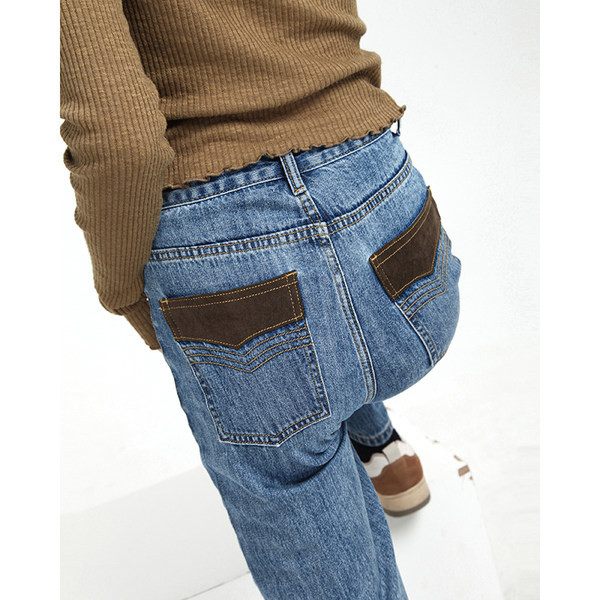 Naiste kõrge vöökoha ja taskutega teksapüksid