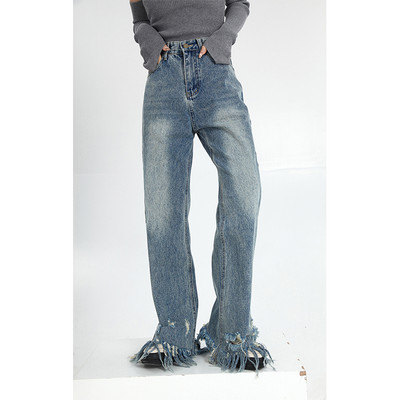 Aktuális női farmer széles modell szakadt motívumokkal