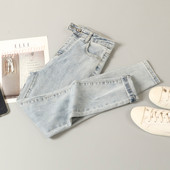 Elastsed kõrge vöökohaga teksad