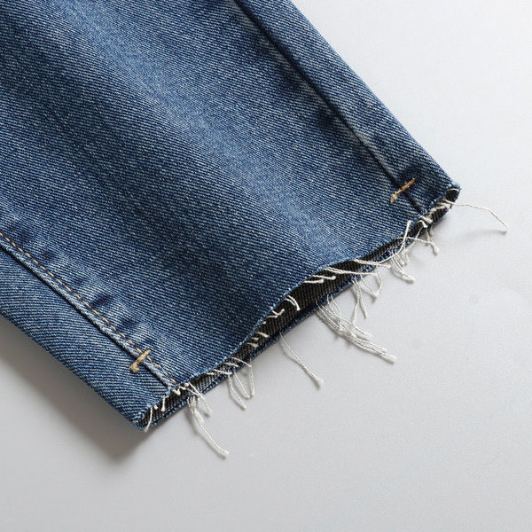 Széles farmer övvel és zsebekkel