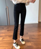 Naiste mustad ja kõrge vöökohaga teksad