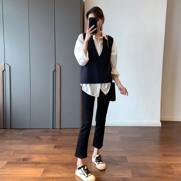 Naiste mustad ja kõrge vöökohaga teksad