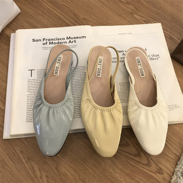 Suletud esiosaga vabaaja kunstnahast sandaalid