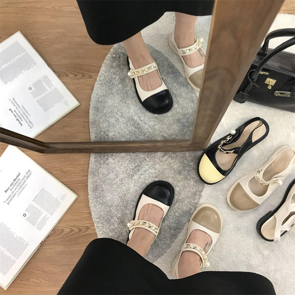 Naiste kunstnahast sandaalid ketiga