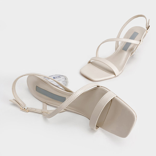 Moodsad nahast rihmade ja läbipaistva kontsaga naiste sandaalid