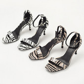 Naiste sandaalid kontsa ja loomatrükiga