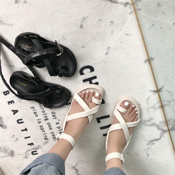 Naiste ristrihmadega nahast sandaalid