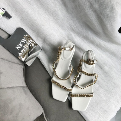 Naiste metallist rihmadega sandaalid