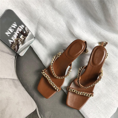 Naiste metallist rihmadega sandaalid