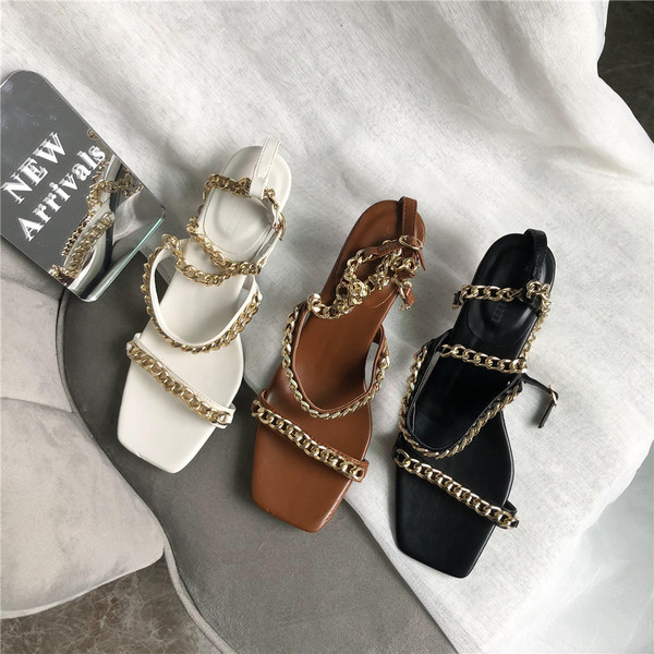 Naiste metallist rihmadega sandaalid