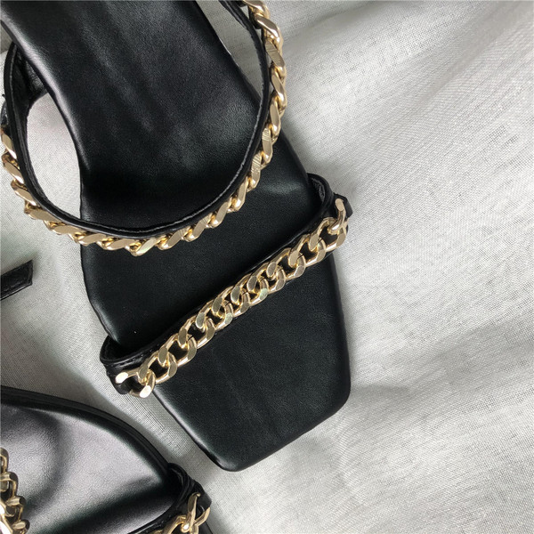 Naiste metallist rihmadega sandaalid