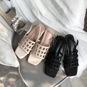 Pandlaga naiste sandaalid