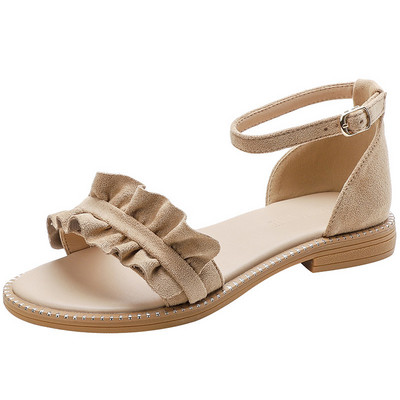 Uus lokkide ja lameda tallaga sandaalide mudel