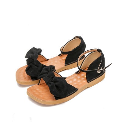 Alkalmi női szandál - lapos talppal és szalaggal