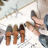 Naiste sandaalid kunstnahast või madala kontsaga tekstiilist