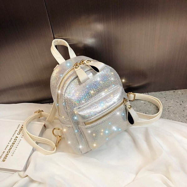 Kahes värvitoonis läikiva efektiga naiste seljakott