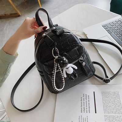 Naiste igapäevane kunstnahast seljakott võtmehoidjaga