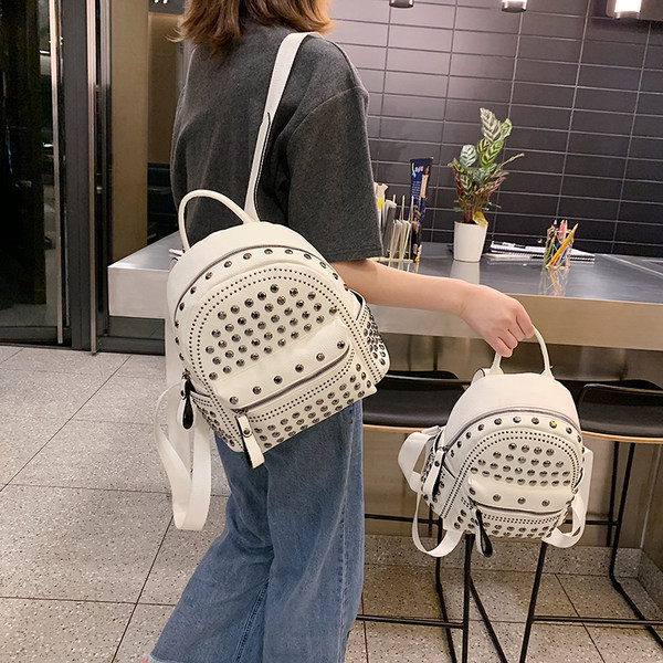 Stiilne kahe mudeli metallist aasadega naistekott