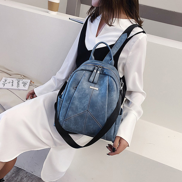 Mitmes värvitoonis lukuga naiste seljakott