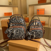 Moodne naiste seljakott kahes mudelis loomatrükiga