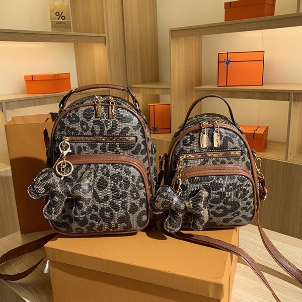 Moodne naiste seljakott kahes mudelis loomatrükiga