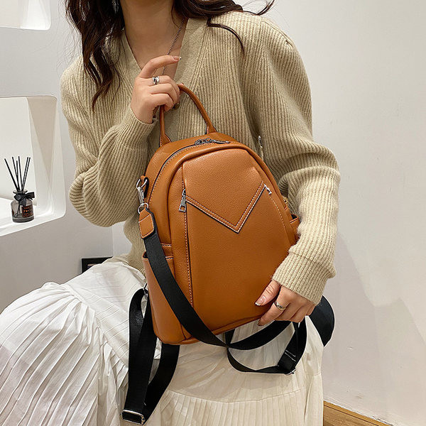 Moodne ökonahast küljetaskutega naiste seljakott