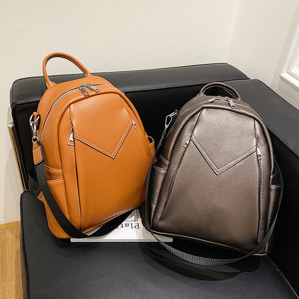 Moodne ökonahast küljetaskutega naiste seljakott