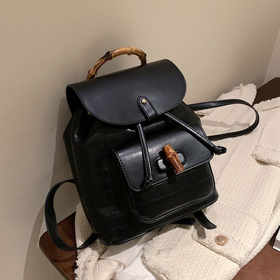 Naiste kaasaegne seljakott puidust käepideme ja lipsudega