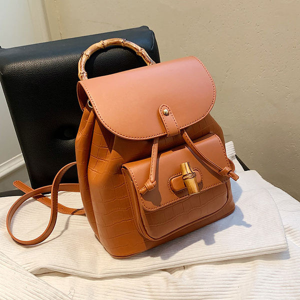 Naiste kaasaegne seljakott puidust käepideme ja lipsudega