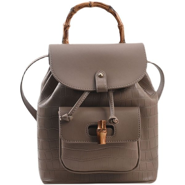 Naiste kaasaegne seljakott puidust käepideme ja lipsudega