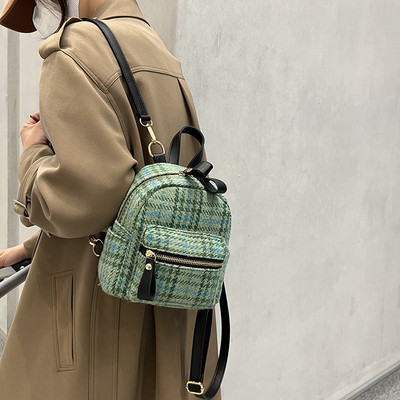 Női hátizsák zöld elülső zsebbel