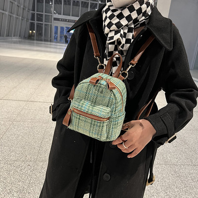 Női hátizsák zöld elülső zsebbel