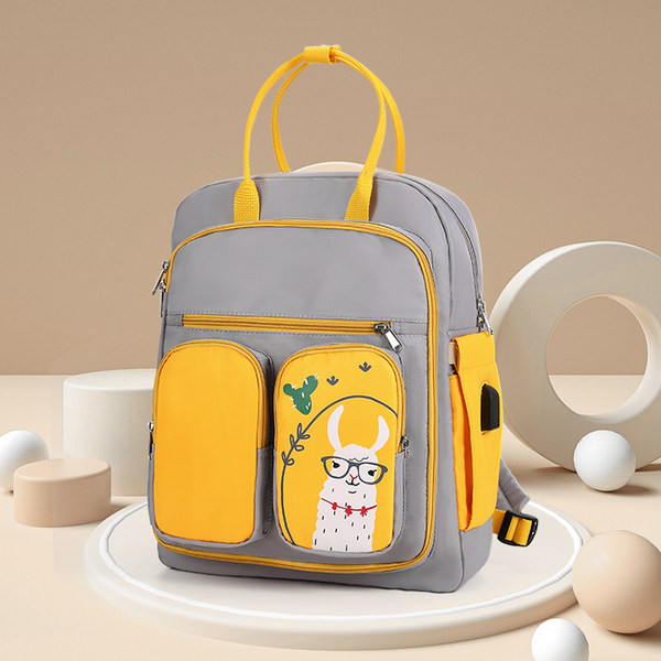 Γυναικείο σακίδιο πλάτης σε γκρι και ροζ χρώμα με απλικέ