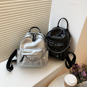 Naiste metallkaunistusega lakknahast seljakott