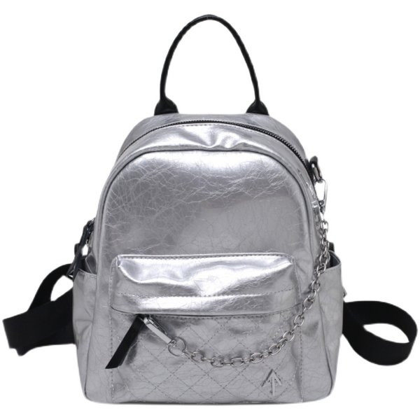 Naiste metallkaunistusega lakknahast seljakott