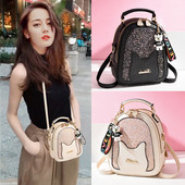 Moodne naiste seljakott läikiva elemendi ja lukuga