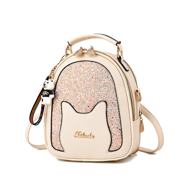 Moodne naiste seljakott läikiva elemendi ja lukuga