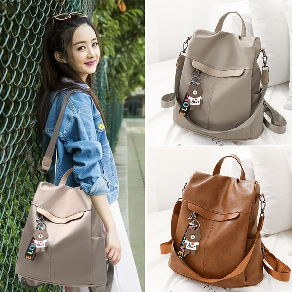 Alkalmi műbőr hátizsák elülső zsebbel